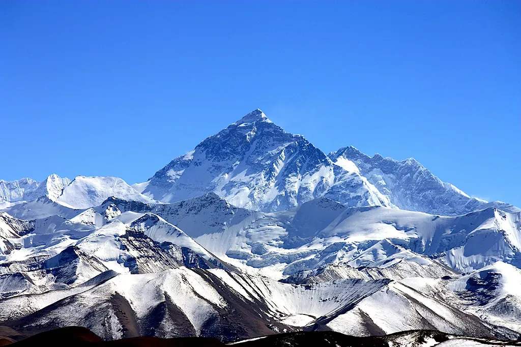 A photo of a large, snow-capped mountain